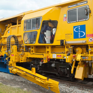 universal ballast spreading and profiling machine