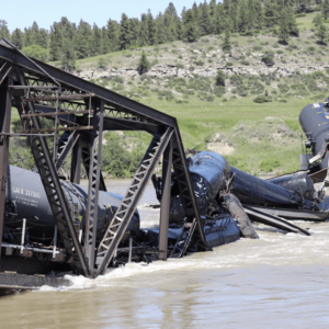 the collapse of a bridge under a freight train
