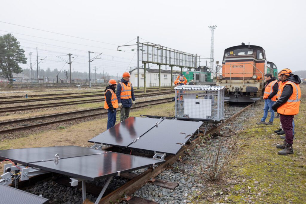 SNCF is testing solar panels on unused train tracks to explore new energy solutions. AREP, its subsidiary, deployed a reversible solar power plant for six months of performance testing