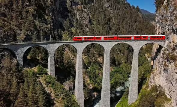 The Bernina Express offers an unforgettable journey through the Alps The Bernina Express offers an unforgettable journey through the Alps