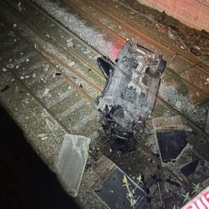 A major train line reopened after crews removed a crashed vehicle blocking tracks. The incident in Salford, caused by an alleged drunk driver, severely disrupted train operations