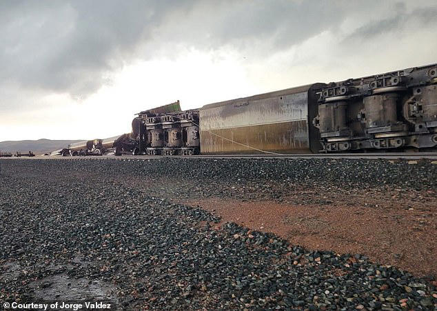 A powerful tornado derailed approximately 130 train cars west of Ashby, Nebraska, late Sunday evening, causing major disruptions along a busy state highway but leaving no one injured.