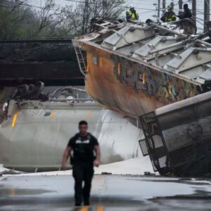 A broken section of track caused a train derailment in Indianapolis, sending five freight cars off a Southeastern Avenue overpass and spilling cornstarch onto the road during routine operations