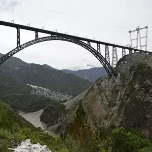 India has launched the world’s tallest rail bridge in the Himalayas, connecting Kashmir to its national network and reinforcing its strategic and economic influence across the volatile region.