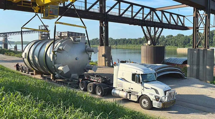 Indiana River & Rail Terminals completed a complex barge-to-truck transload for two 51-ton tanks bound for a pharmaceutical site in central Indiana. Indiana River & Rail Terminals completed a complex barge-to-truck transload for two 51-ton tanks bound for a pharmaceutical site in central Indiana.