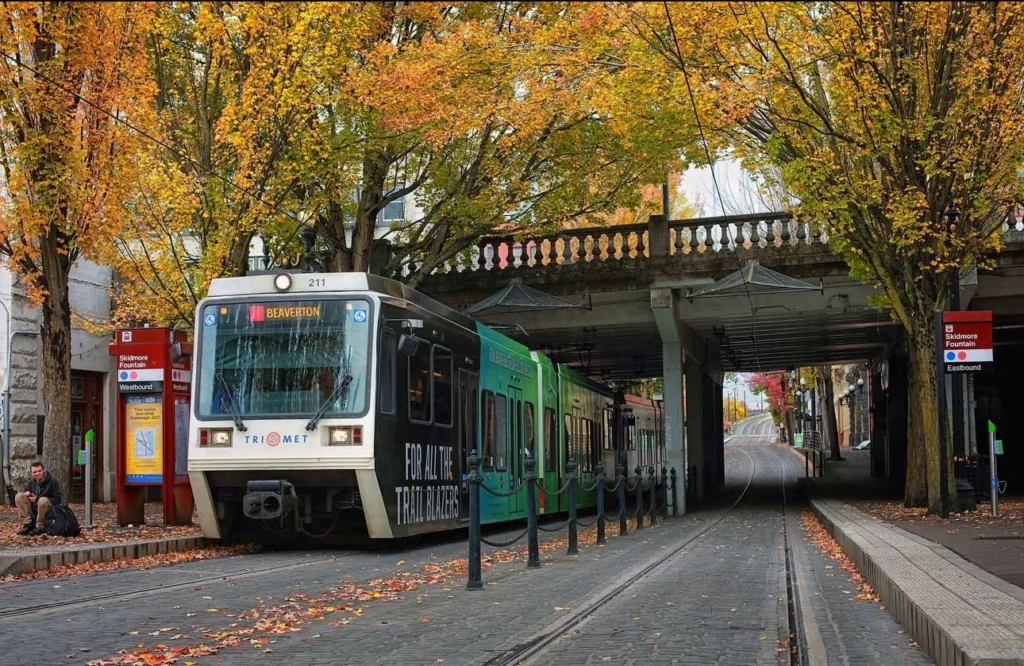 TriMet will permanently close the Skidmore Fountain station on August 24, aiming to shorten travel times for MAX Blue and Red line passengers in downtown Portland and improve overall system reliability. TriMet will permanently close the Skidmore Fountain station on August 24, aiming to shorten travel times for MAX Blue and Red line passengers in downtown Portland and improve overall system reliability.