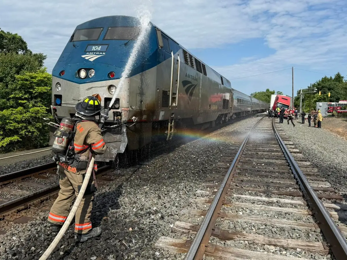 Train strikes semi-truck in deadly Iowa crash