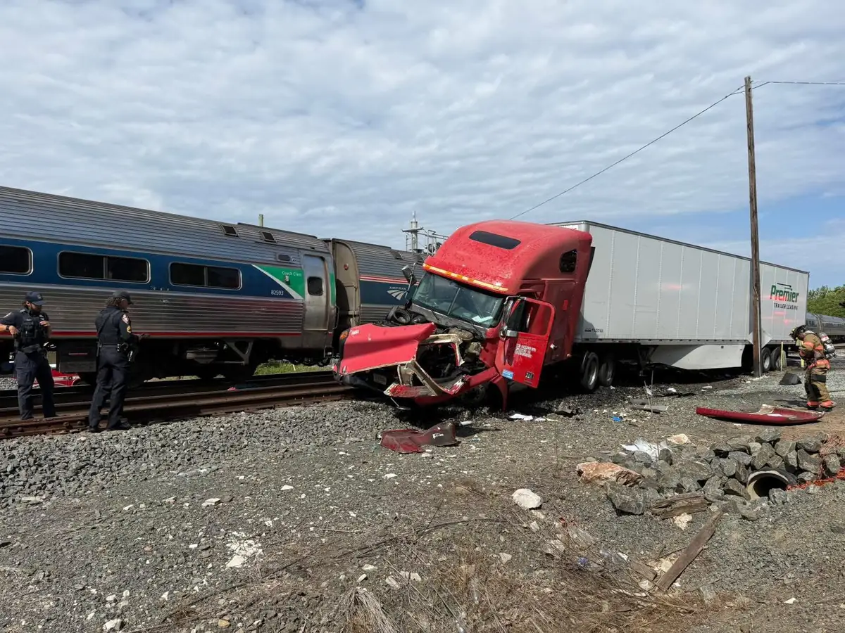 Train strikes semi-truck in deadly Iowa crash