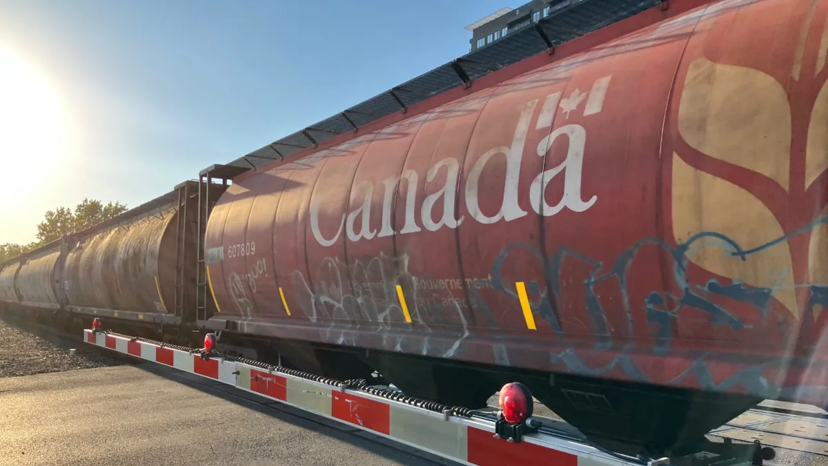 CN grain hopper car CN grain hopper car on railway tracks