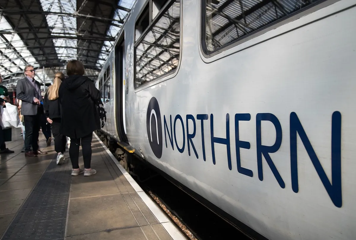Commuters boarding a Northern train Commuters boarding a Northern train