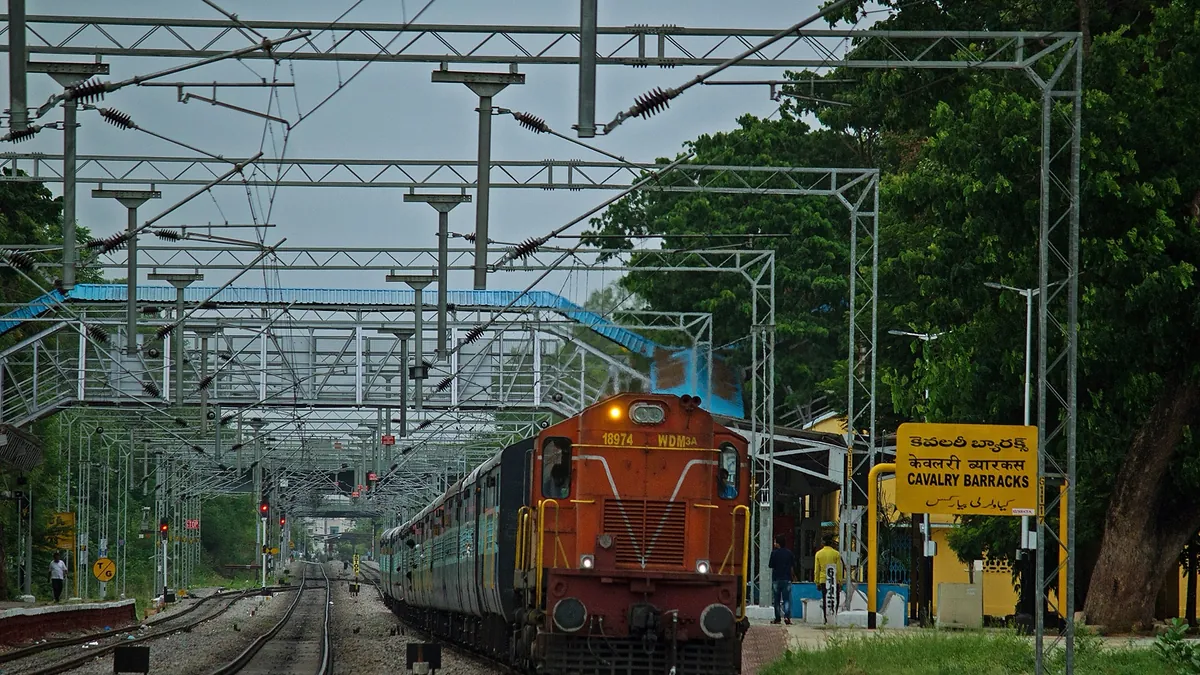 Indian Railways train under overhead lines