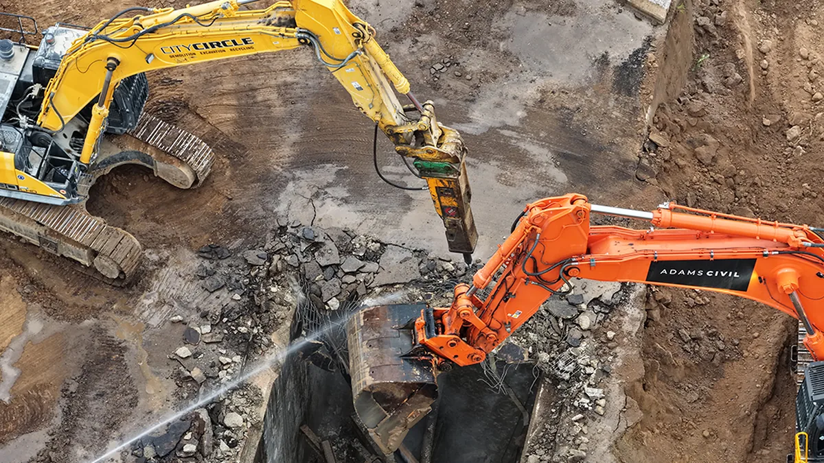 Benalla Station demolition works Close-up view of excavators demolishing the old Benalla Station bridge