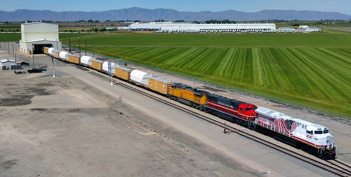 Union Pacific No. 4547 with rocket motor segments Union Pacific No. 4547 hauling rocket motor segments near Corinne Utah