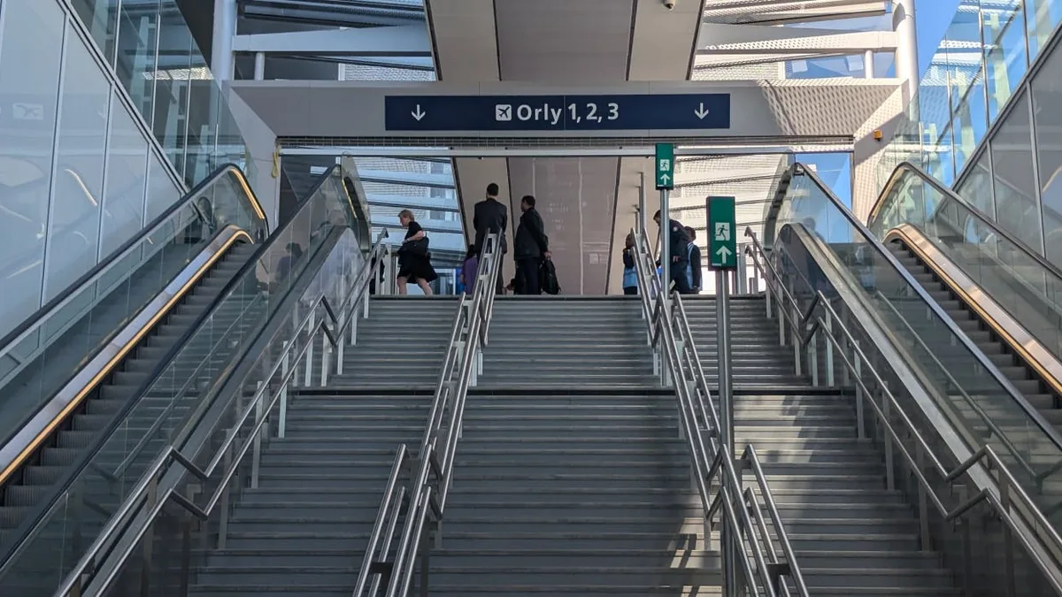 Passengers at the Line 14 exit area at Aéroport d’Orly