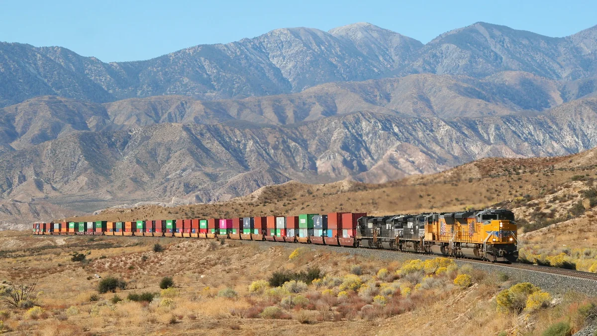 Union Pacific intermodal freight train Union Pacific-led intermodal freight train in a mountain corridor