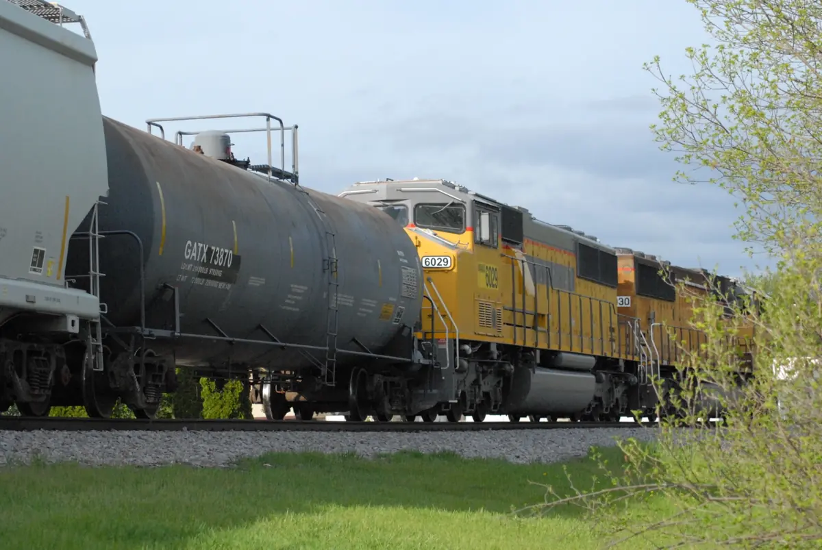 Watco-owned WAMX locomotives passing through Whitewater, Wisconsin