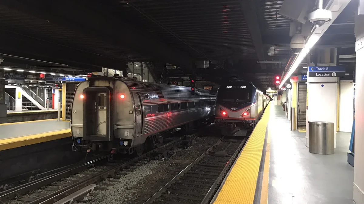Two Amtrak Night Owl Northeast Regional trains at New York Penn Station