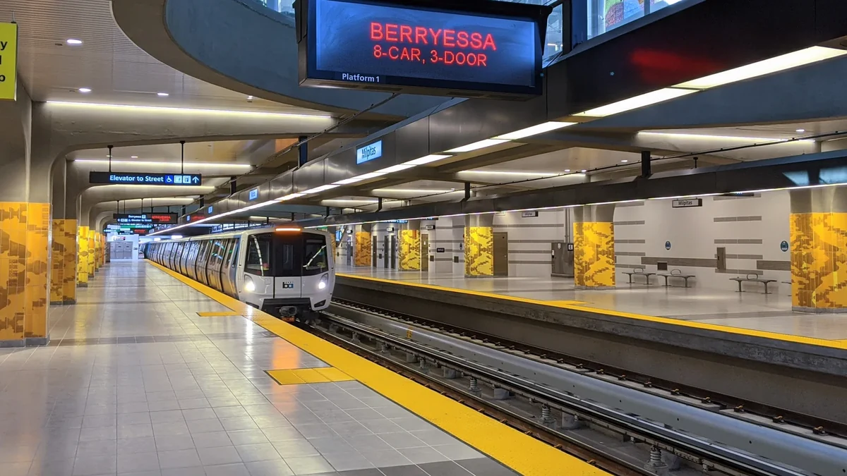 BART train arriving at Milpitas station platform BART train arriving at Milpitas station platform