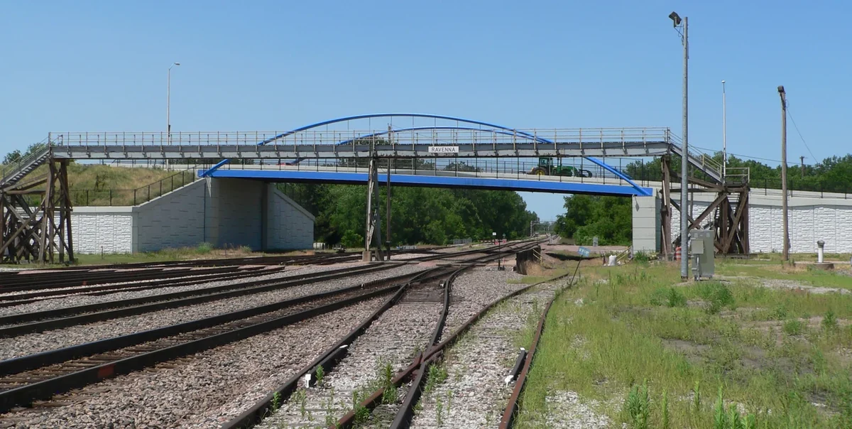 Road overpass and footbridge above BNSF tracks in Ravenna, Nebraska Road overpass and footbridge above BNSF tracks in Ravenna, Nebraska