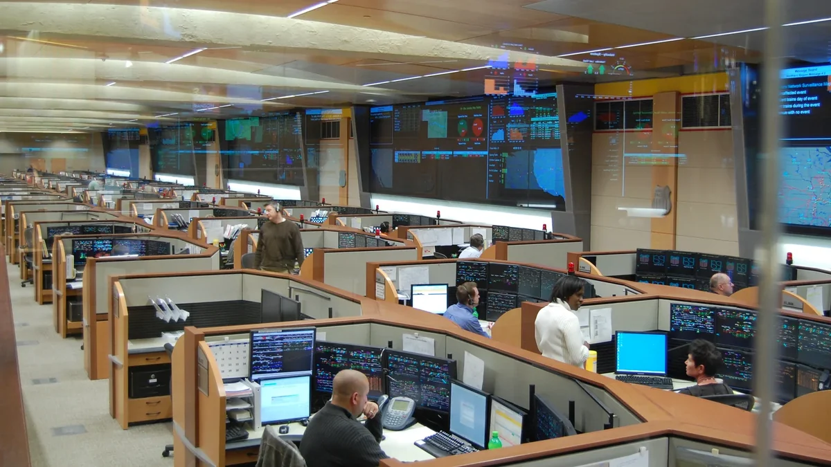 Operations floor inside Union Pacific’s Harriman Dispatch Center with workstations and rail-network monitoring displays Operations floor inside Union Pacific’s Harriman Dispatch Center with workstations and rail-network monitoring displays