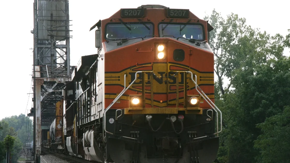 Illustrative image of BNSF locomotive 5207 leading a freight train across a bridge in Alabama. Illustrative image of BNSF locomotive 5207 leading a freight train across a bridge in Alabama.