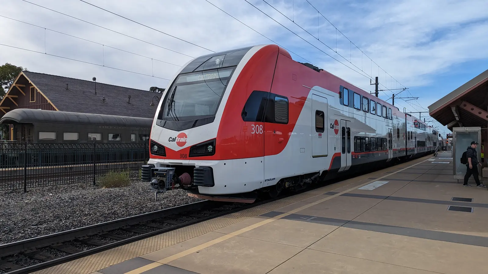 Caltrain Stadler KISS electric train at Santa Clara station under overhead wires Caltrain Stadler KISS electric train at Santa Clara station under overhead wires