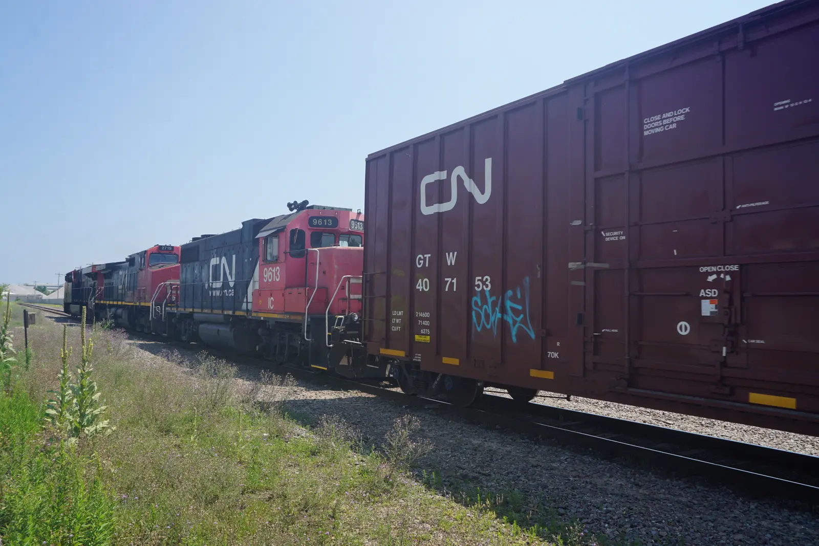 Canadian National freight locomotives hauling freight cars in Green Bay, Wisconsin Canadian National freight locomotives hauling freight cars in Green Bay, Wisconsin