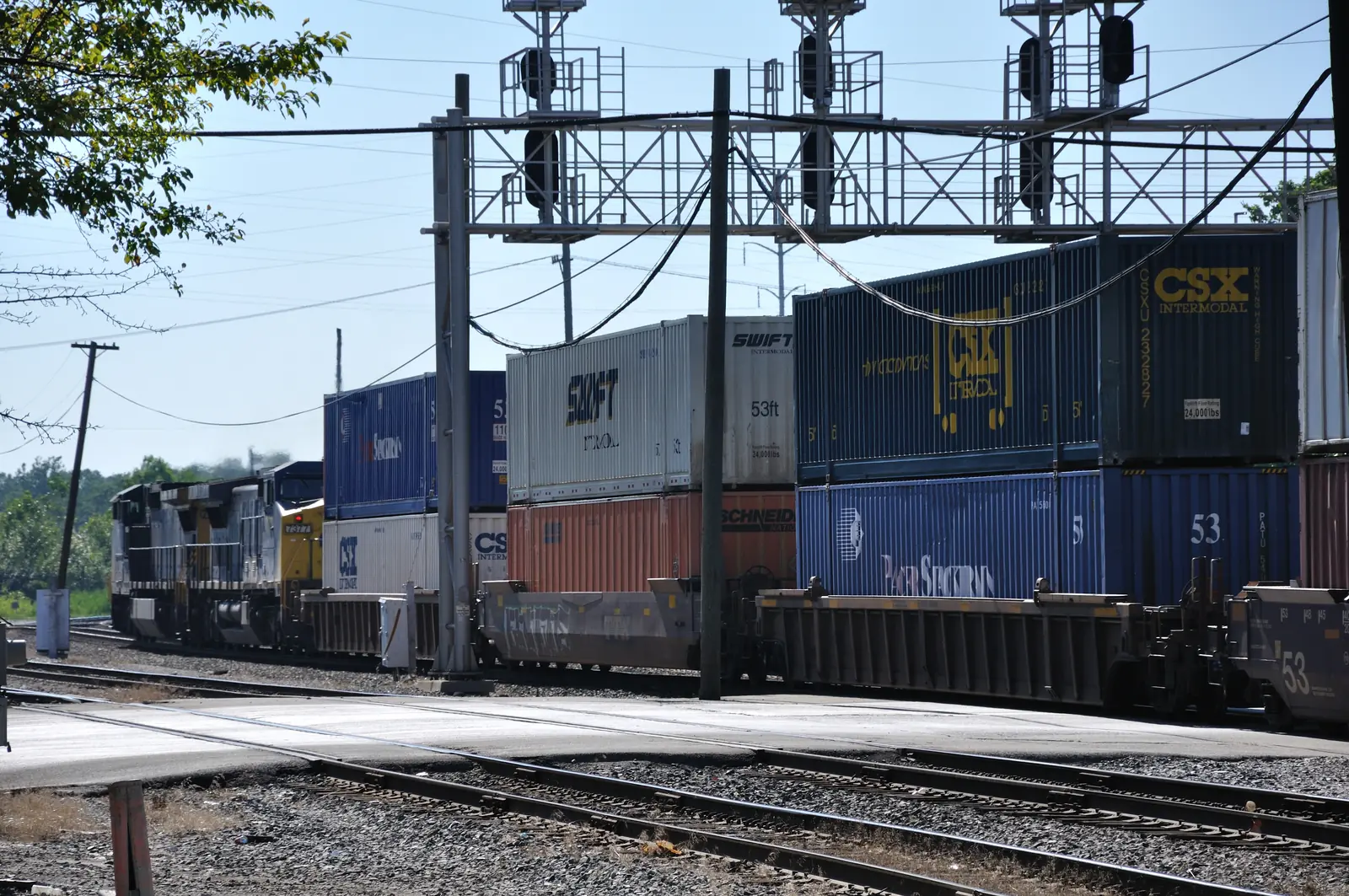 Double-stack CSX intermodal containers moving through Dolton, Illinois Double-stack CSX intermodal containers moving through Dolton, Illinois