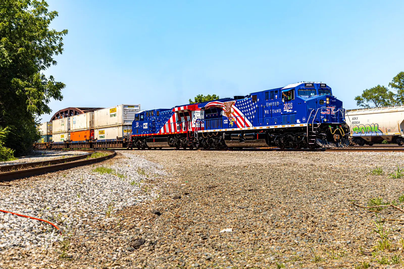 CSX America 250 locomotives No. 2026 and No. 250 leading an intermodal train through Blue Island Junction, Illinois. CSX America 250 locomotives No. 2026 and No. 250 leading an intermodal train through Blue Island Junction, Illinois.