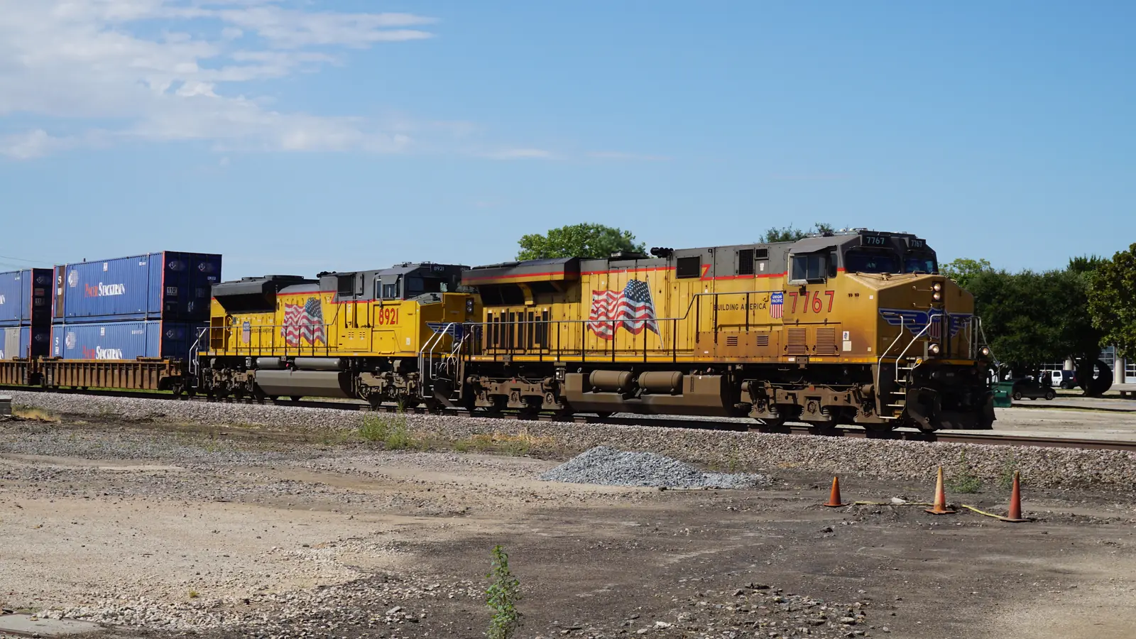 Illustrative view of two Union Pacific locomotives hauling an intermodal freight train in Denton, Texas. Illustrative view of two Union Pacific locomotives hauling an intermodal freight train in Denton, Texas.