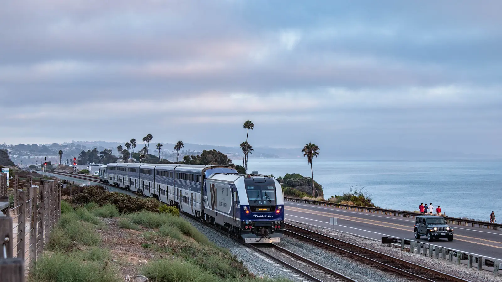 Pacific Surfliner train traveling beside the Pacific coast near Encinitas, California