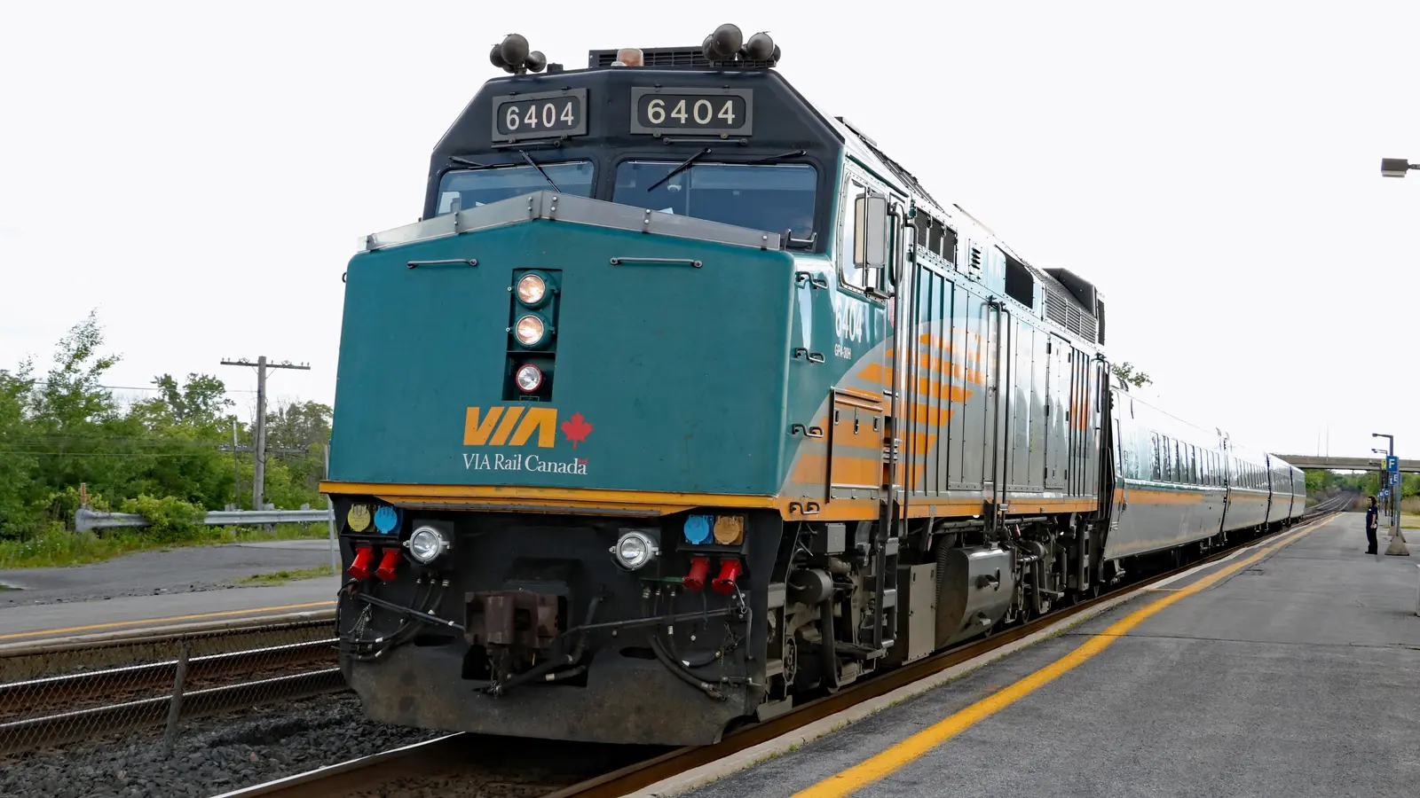 A VIA Rail locomotive and passenger train at Kingston station in Ontario. A VIA Rail locomotive and passenger train at Kingston station in Ontario.