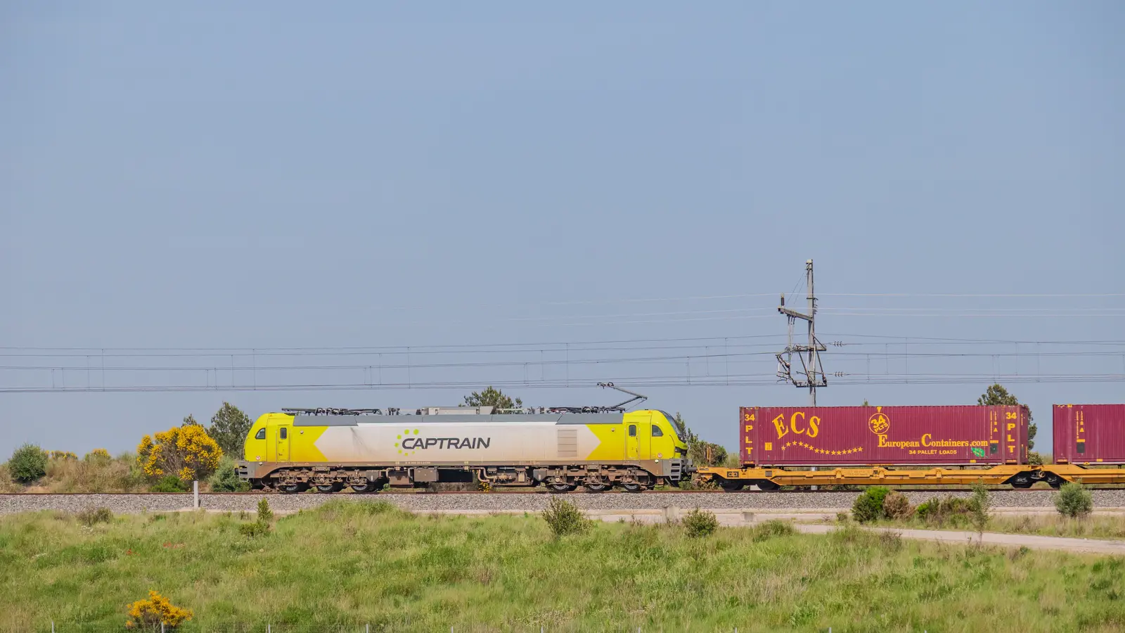 A Captrain Stadler EURO6000 electric locomotive hauling an intermodal freight train