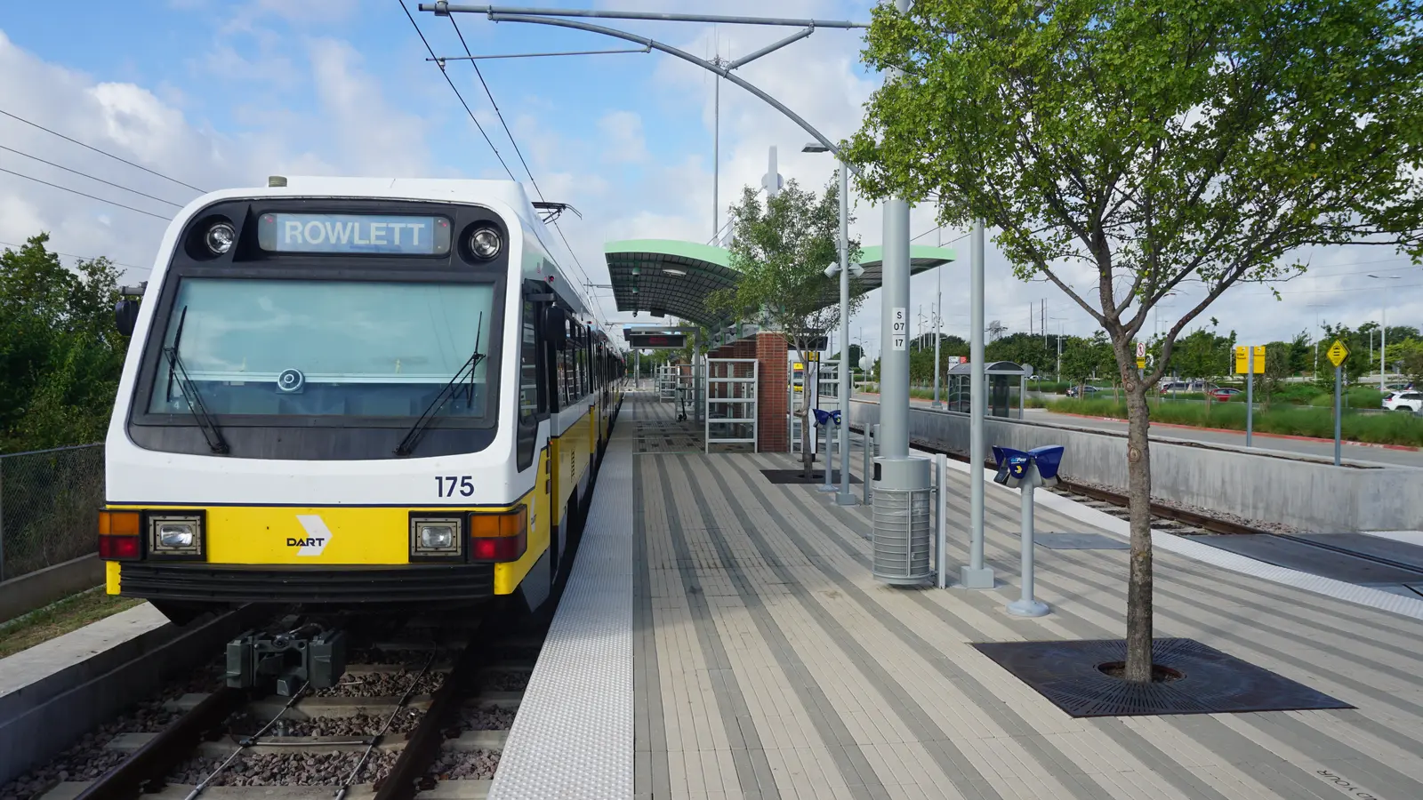 DART Blue Line train beside the platform at UNT Dallas Station.