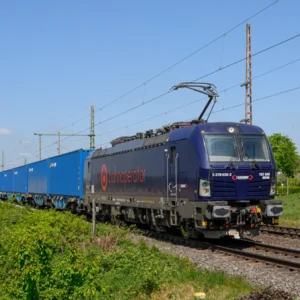 CARGOUNIT Vectron locomotive hauling a container train in Germany
