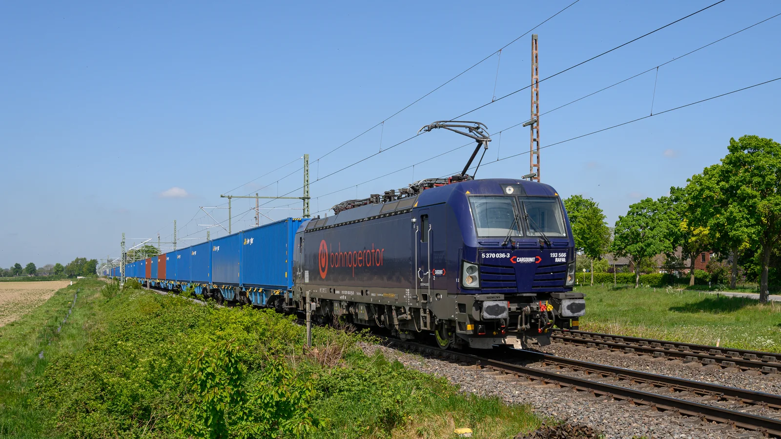 CARGOUNIT Vectron locomotive hauling a container train in Germany CARGOUNIT Vectron locomotive hauling a container train in Germany