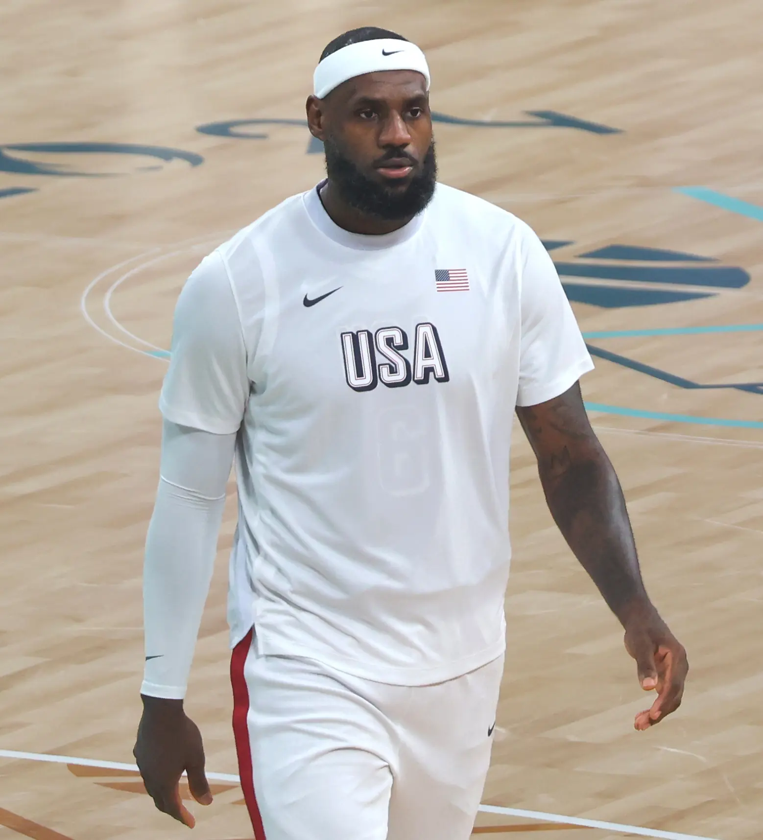 LeBron James wearing a white USA basketball uniform during the Paris 2024 Olympic Games.
