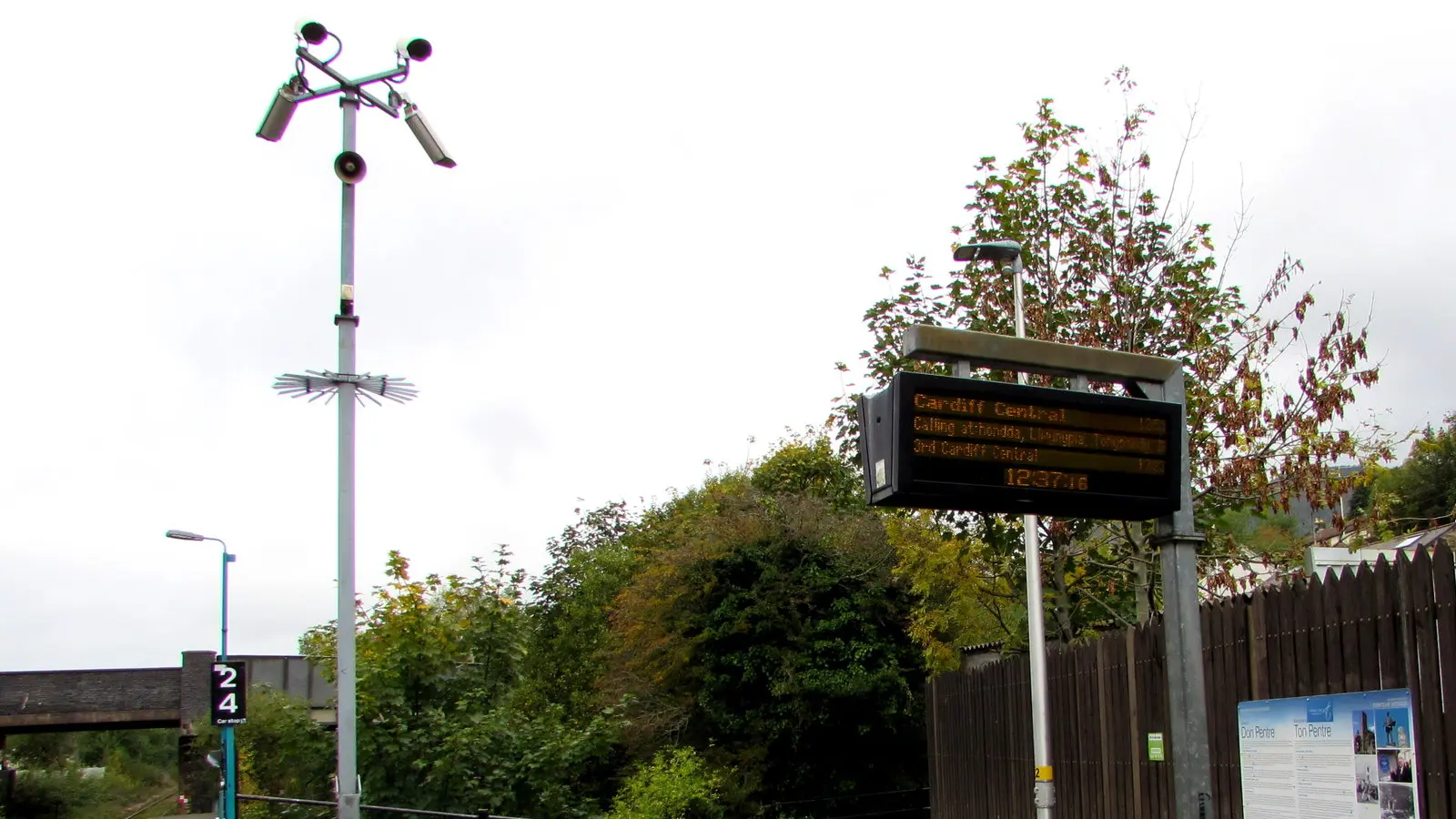 CCTV cameras and a passenger information display at Ton Pentre railway station