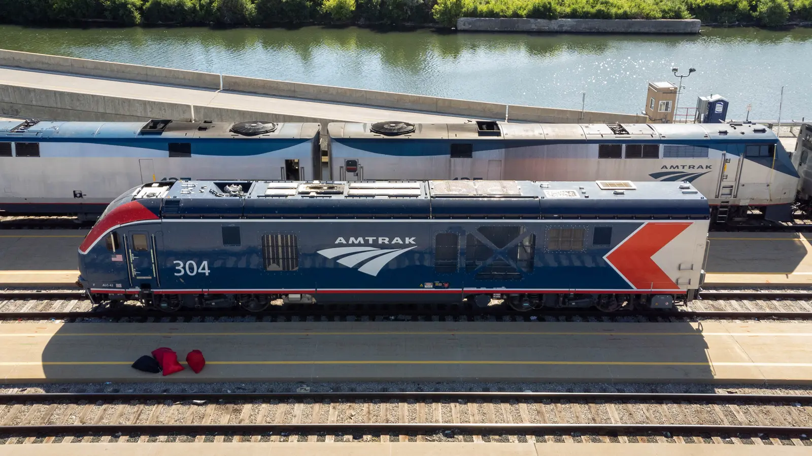 Overhead view of Amtrak ALC-42 locomotive 304 beside another train at Chicago Union Station Overhead view of Amtrak ALC-42 locomotive 304 beside another train at Chicago Union Station