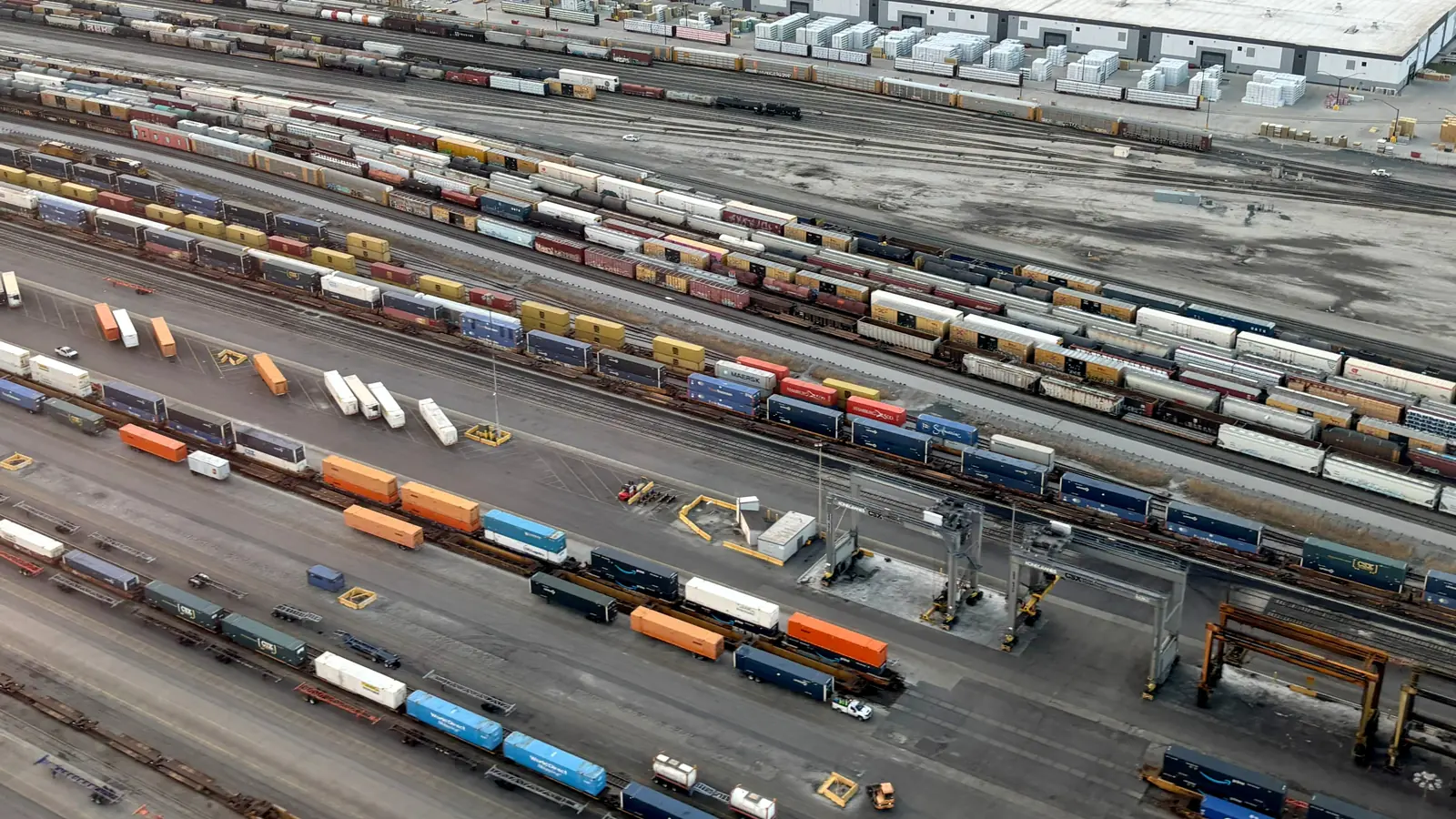 Aerial view of freight cars and intermodal containers at the Belt Railway of Chicago Clearing Yard. Aerial view of freight cars and intermodal containers at the Belt Railway of Chicago Clearing Yard.
