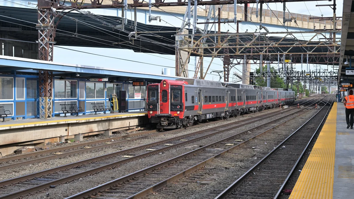 Metro-North M8 train arriving at Bridgeport station beneath New Haven Line catenary. Metro-North M8 train arriving at Bridgeport station beneath New Haven Line catenary.