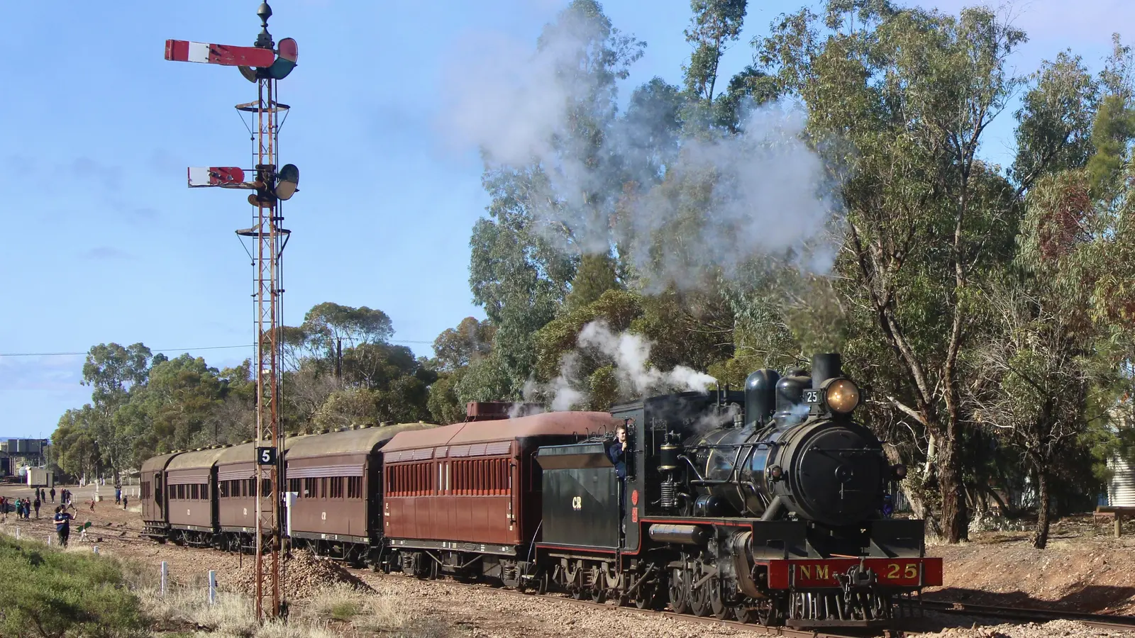 Steam locomotive NM25 hauling a Pichi Richi Railway passenger train out of Quorn Steam locomotive NM25 hauling a Pichi Richi Railway passenger train out of Quorn