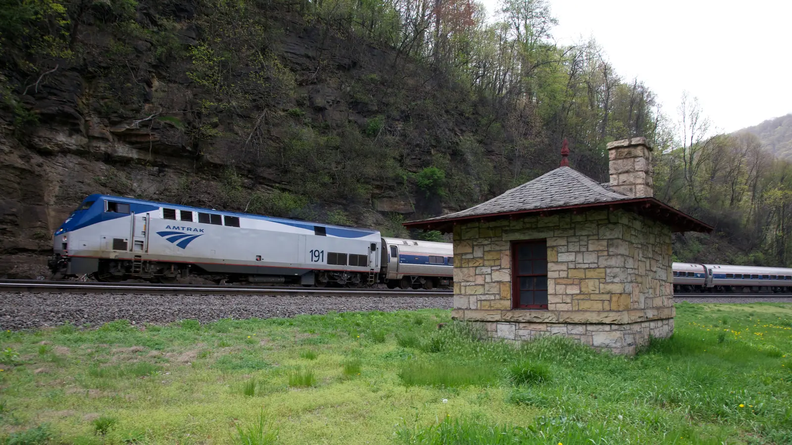 Amtrak Pennsylvanian train passing Horseshoe Curve in Pennsylvania Amtrak Pennsylvanian train passing Horseshoe Curve in Pennsylvania