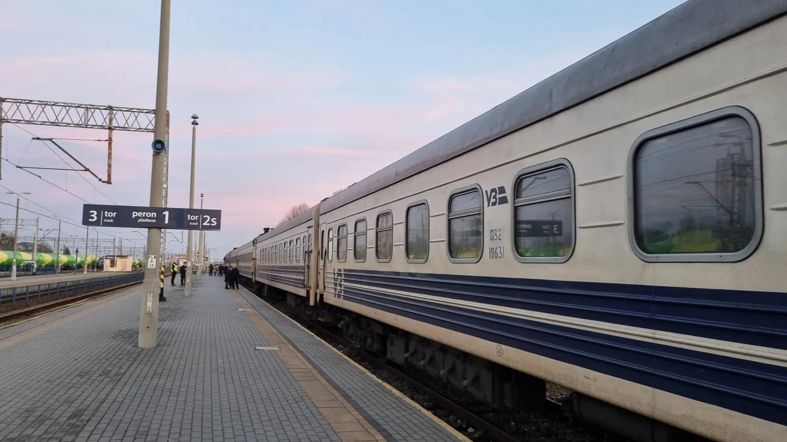 Ukrzaliznytsia passenger cars standing beside a station platform in Chełm Ukrzaliznytsia passenger cars standing beside a station platform in Chełm
