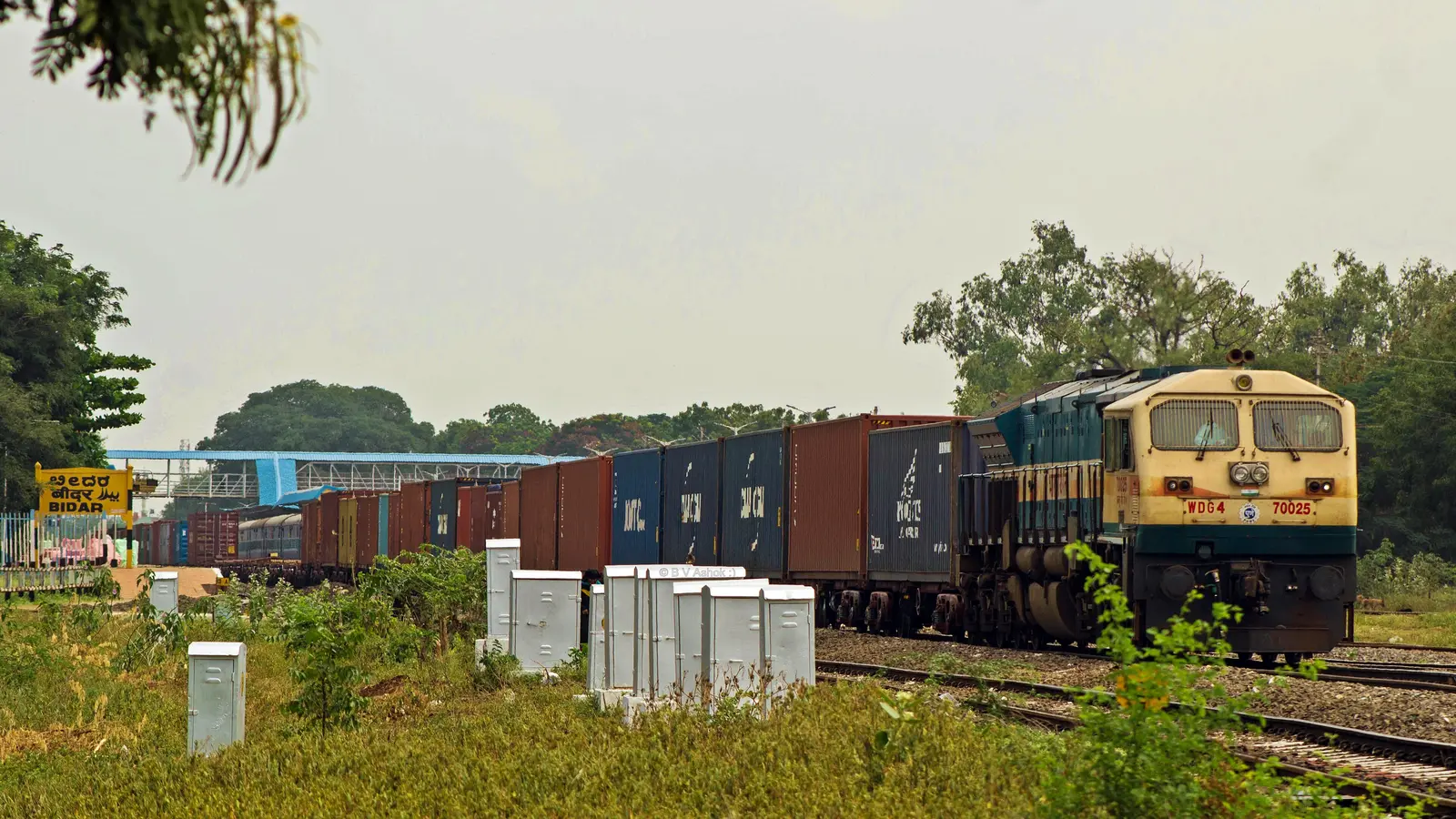 Indian Railways WDG-4 locomotive hauling a container train at Bidar in Karnataka Indian Railways WDG-4 locomotive hauling a container train at Bidar in Karnataka