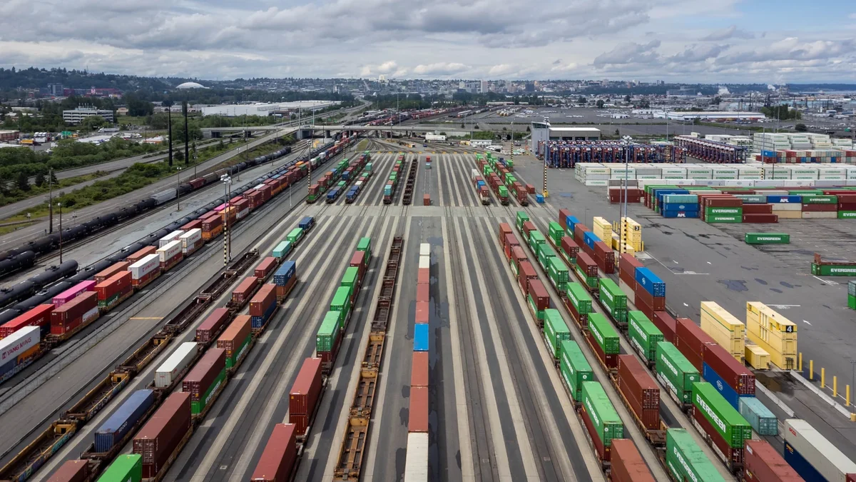 Aerial view of an intermodal rail yard with container trains at the Port of Tacoma. Aerial view of an intermodal rail yard with container trains at the Port of Tacoma.
