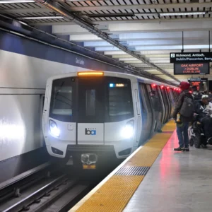 Passengers boarding a BART Blue Line train at Civic Center/UN Plaza station in San Francisco.