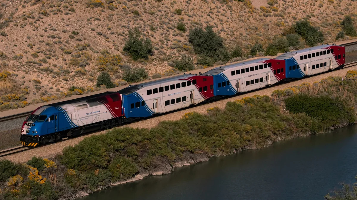 FrontRunner train traveling through the Jordan Narrows in Utah. FrontRunner train traveling through the Jordan Narrows in Utah.