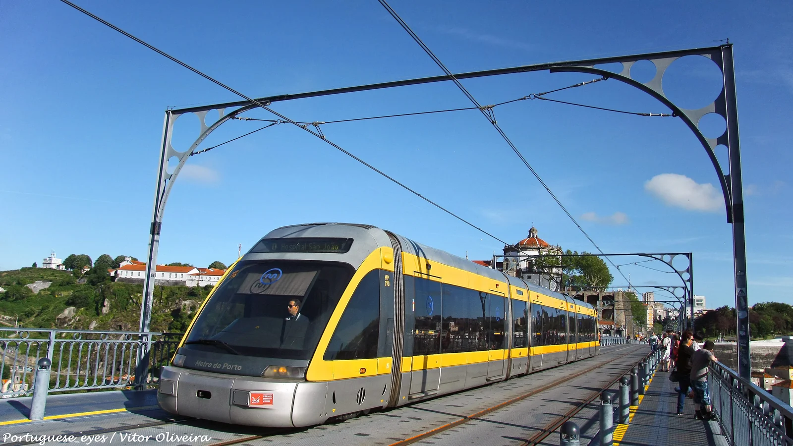 Metro do Porto Eurotram crossing the Dom Luís I Bridge in Vila Nova de Gaia