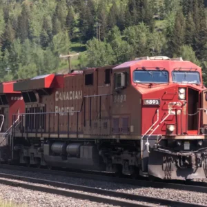 Canadian Pacific locomotives hauling a freight train through Crowsnest Pass in British Columbia